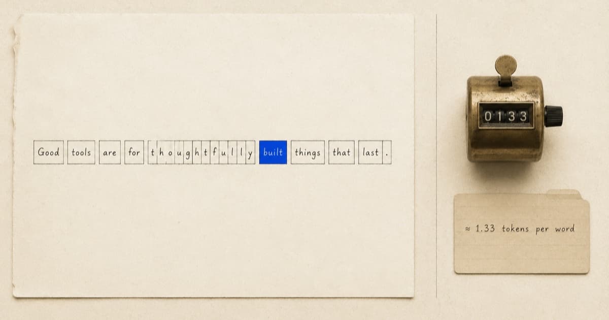 Editorial still life: a hand-lettered sentence on cream paper with every token boxed in ink, one box in cobalt blue, beside a brass tally counter and a card reading 1.33 tokens per word.