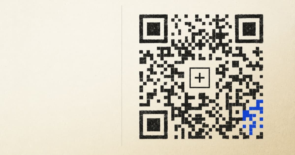 Hand-printed QR code on cream paper with a centered plus-mark logo, one cell region rendered in cobalt blue as a single accent.